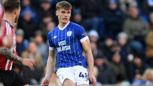 “Is Lawlor’s Future at Cardiff Secure Despite Bayern Munich’s Interest? Discover the Impact on His Playing Time!