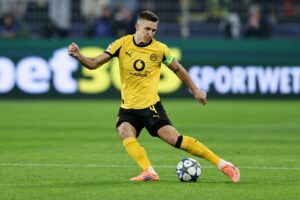 Who Is the Bundesliga Defender Sparking Interest from Liverpool, Bayern Munich, and Barcelona?